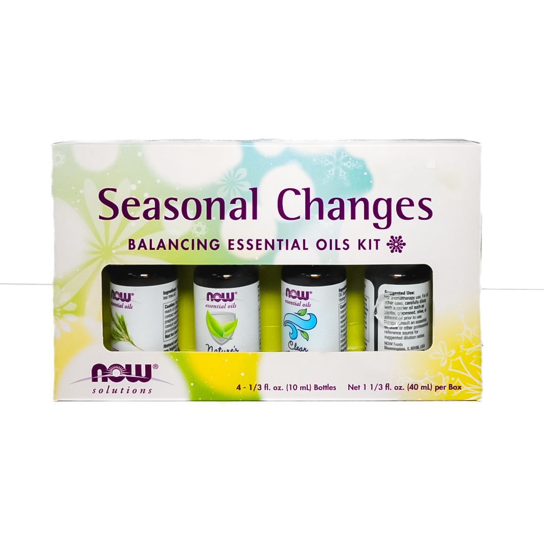 Seasonal Changes essential oils kit box with four NOW brand bottles on a white and yellow background
