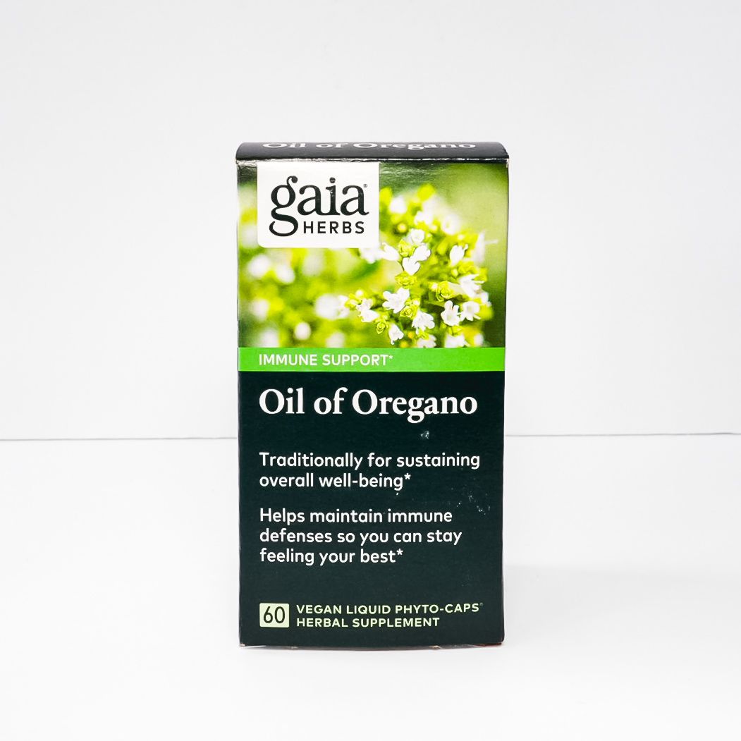 Gaia Herbs Oil of Oregano supplement box with green leaves and white flowers on a white background