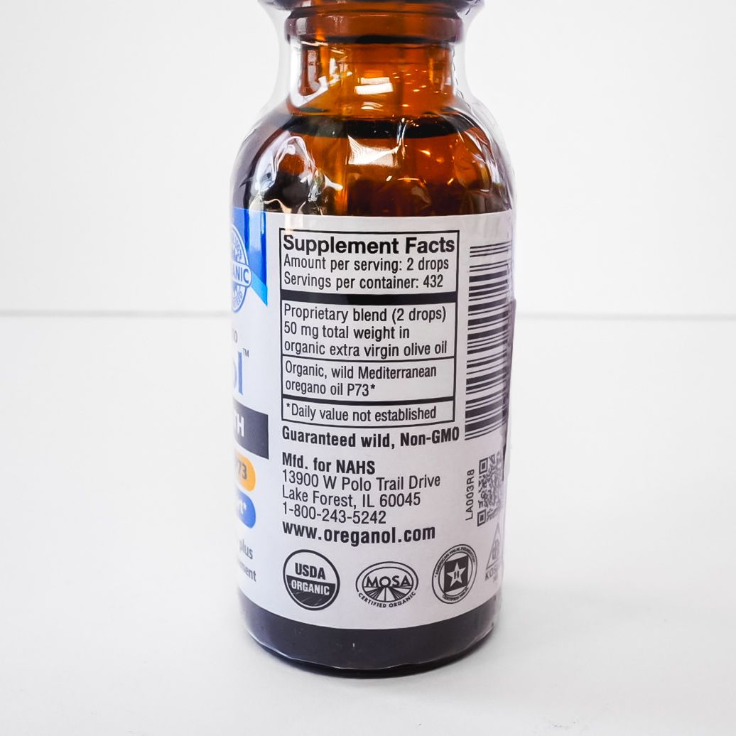 Brown dropper bottle of Oreganol Super Strength supplement with blue label