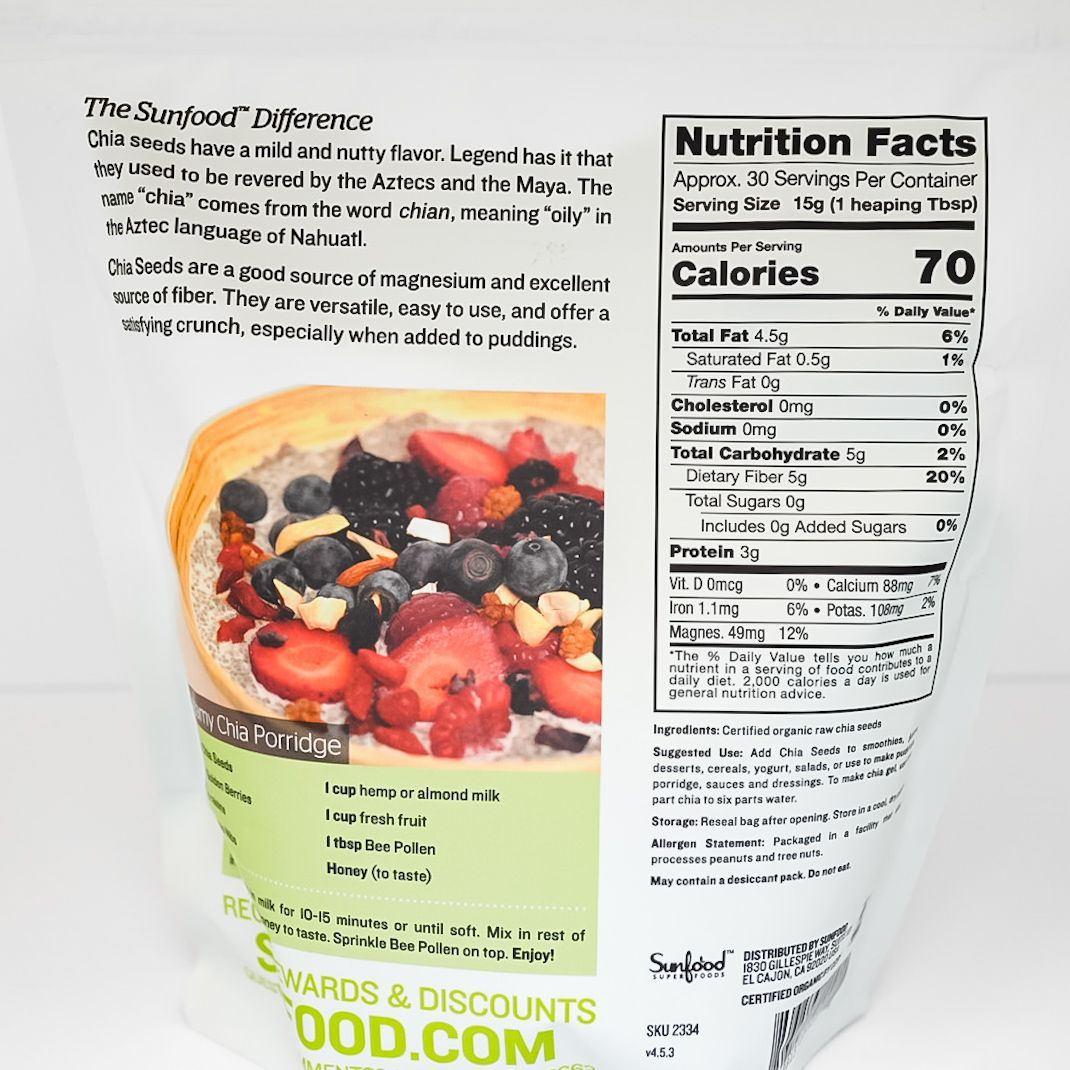 White pouch of Sunfood raw organic chia seeds with seed image and purple flower illustration