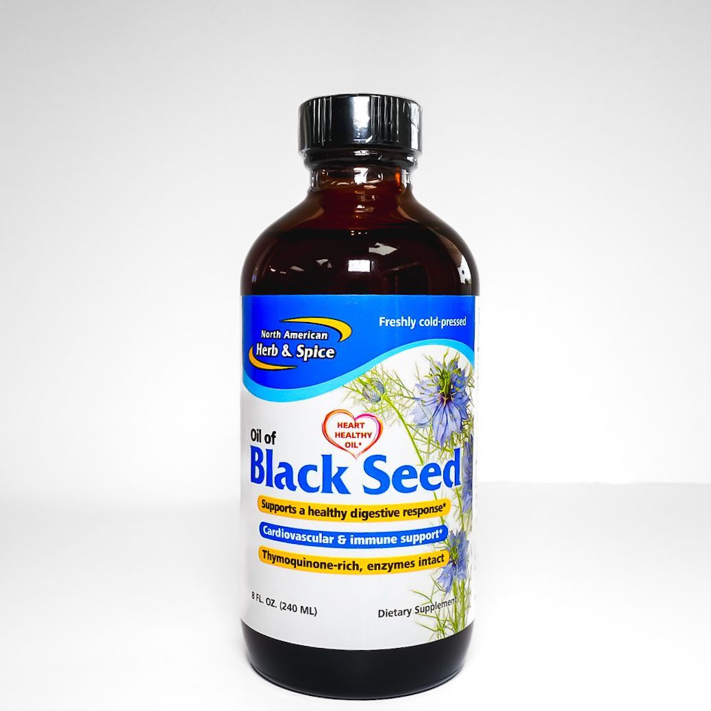 Brown bottle labeled “Black Seed” with a blue and white label on a white background