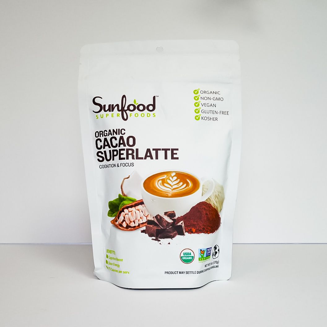 White pouch of Sunfood organic cacao superlatte with latte and cacao image on the front.