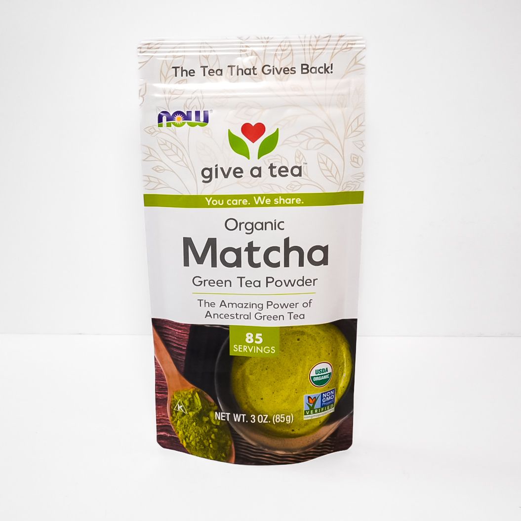 Organic green tea powder pouch with white, green, and brown packaging from Give Tea.