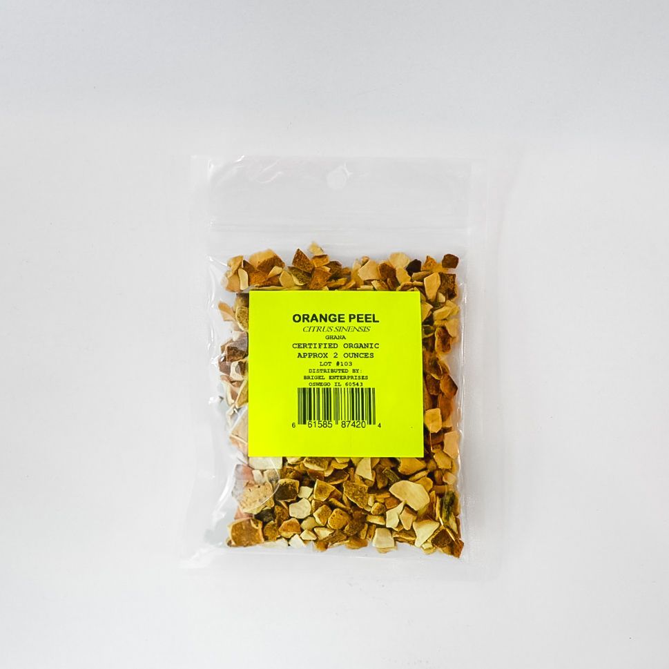Clear bag of dried orange peel with a bright yellow label on a white background