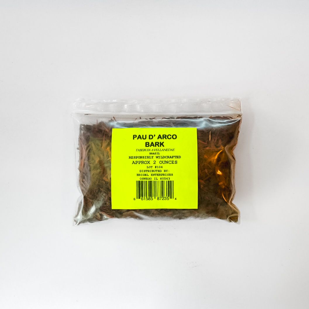 Plastic bag of dried herbs with a bright yellow label on a white background