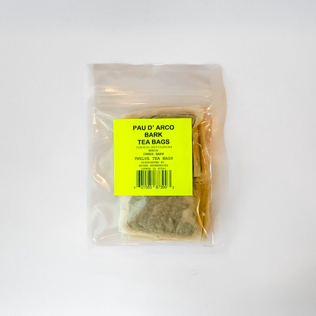 Small clear plastic bag with a bright yellow label containing brown food or spice powder.