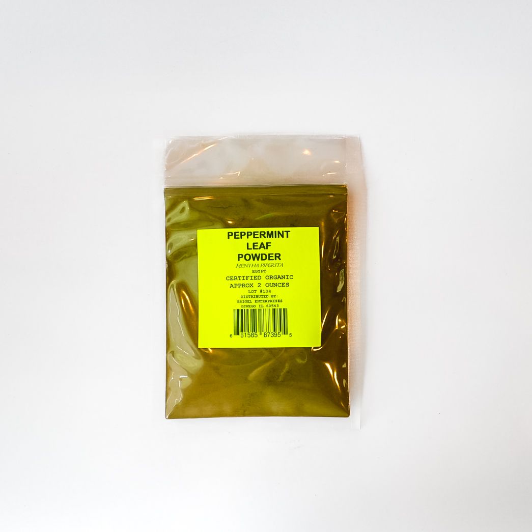 Small clear plastic bag with yellow-green contents and a bright yellow label on a white background