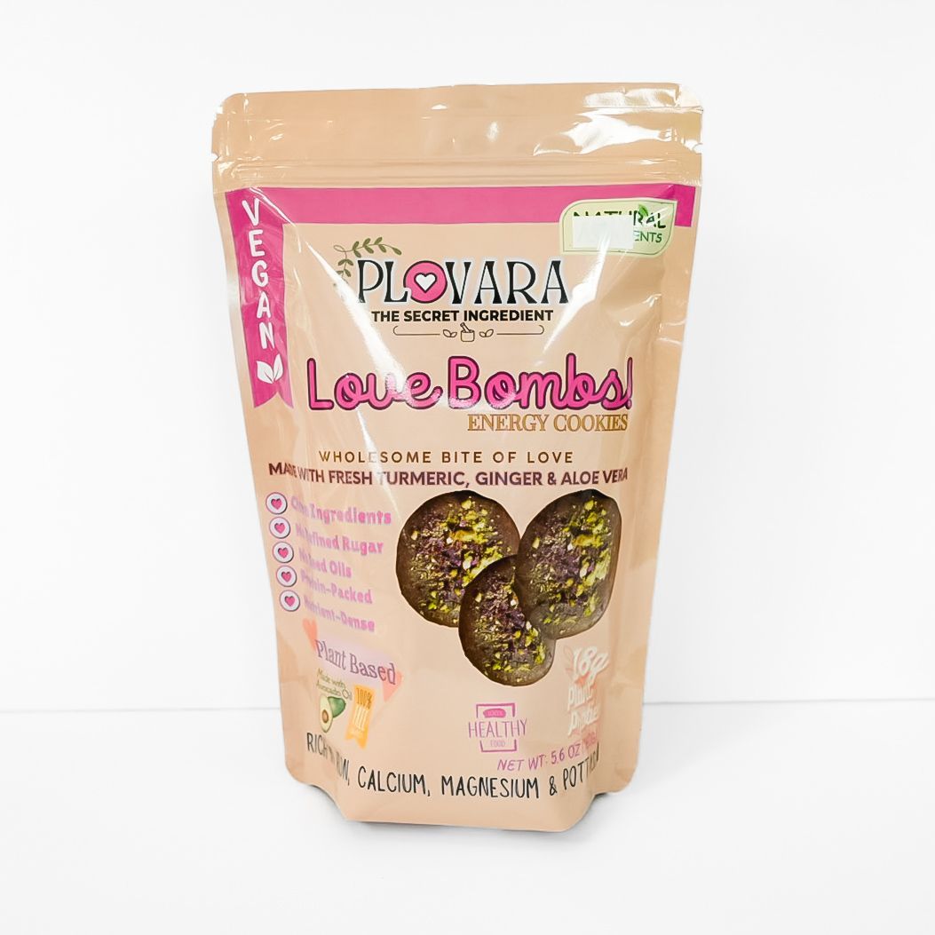Pink resealable pouch of Piovara Love Bombs snacks with green cluster illustrations