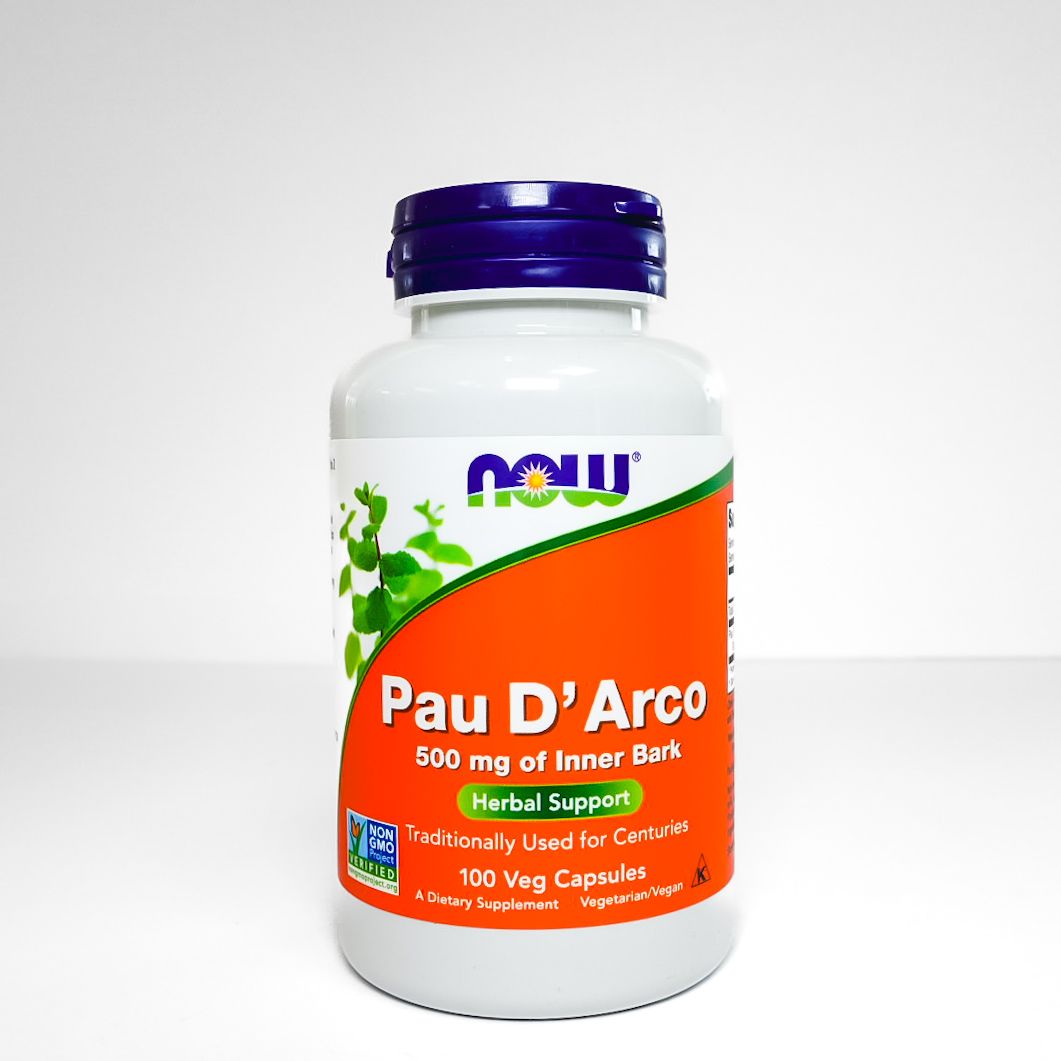 White NOW brand supplement bottle with orange label reading “Pau D’Arco” and blue cap