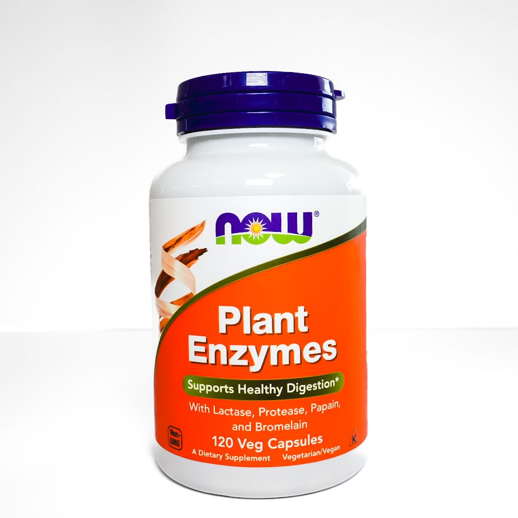 White NOW Foods Plant Enzymes supplement bottle with orange label and purple cap