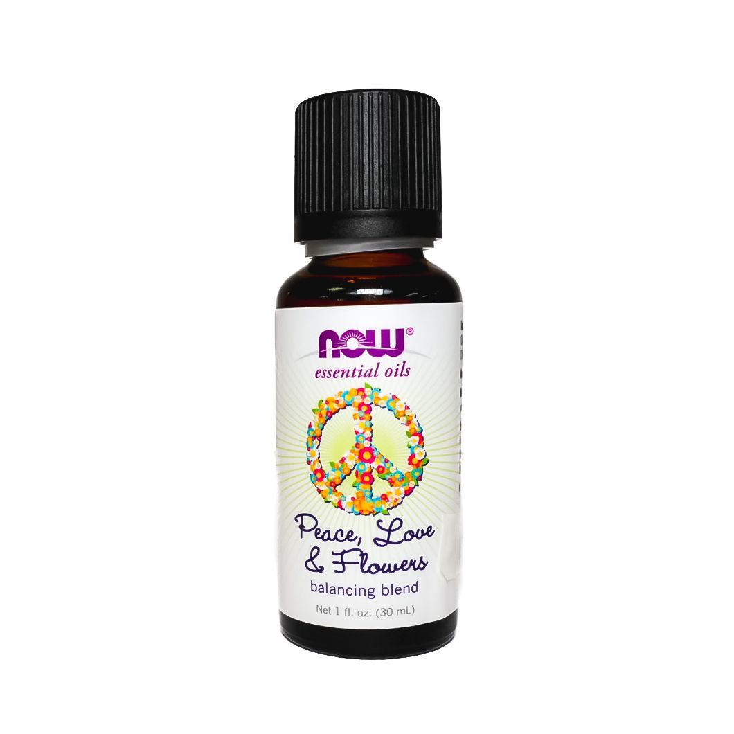 NOW Peace, Love & Flowers aromatherapy essential oil bottle with purple label and black cap