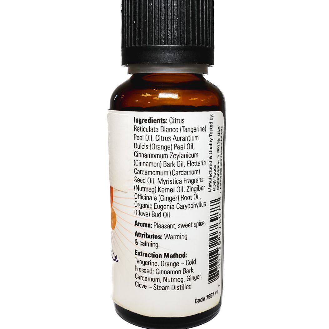 NOW Pumpkin Spice essential oil bottle with black cap and orange pumpkin label