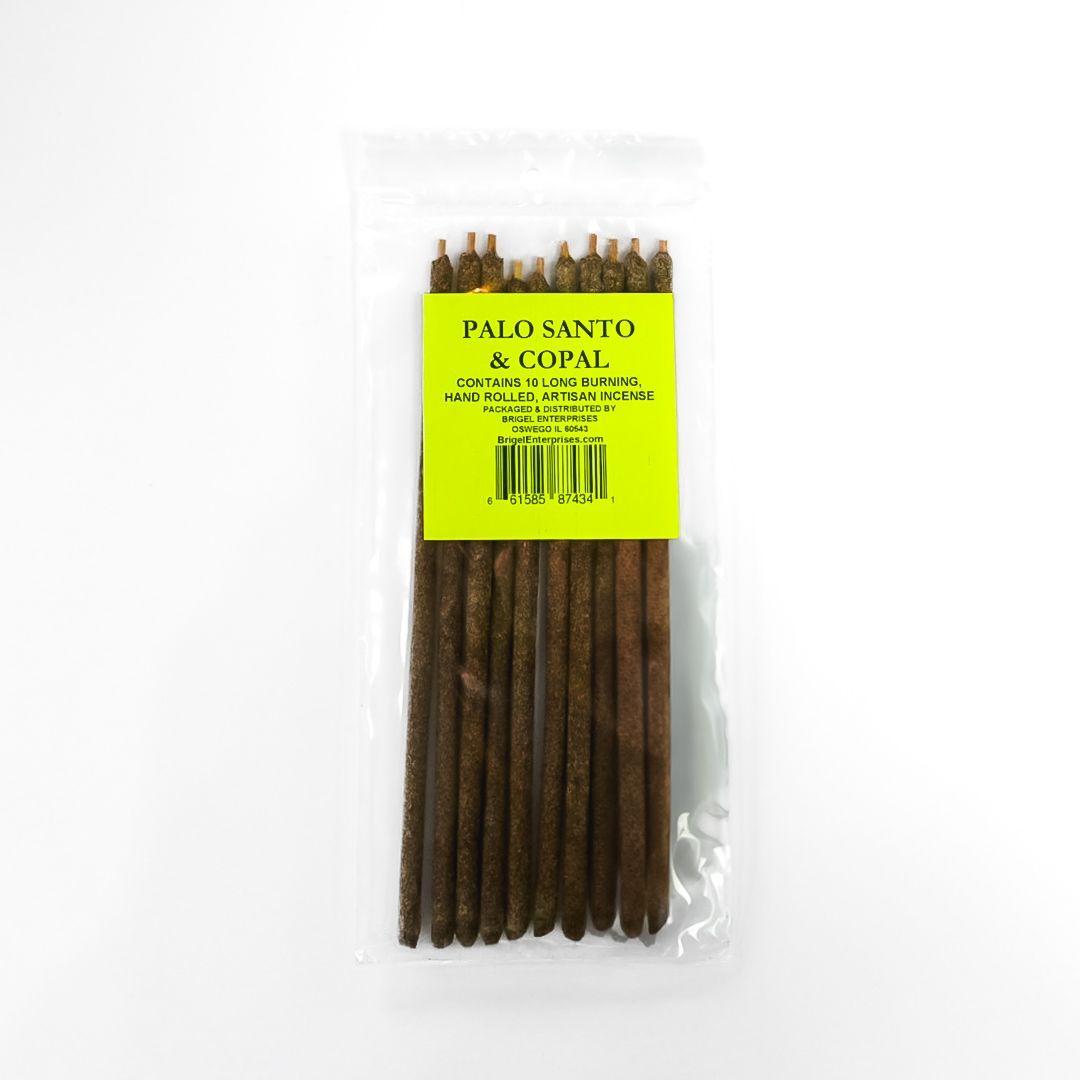 Clear plastic package of brown Palo Santo incense sticks with a bright yellow label.