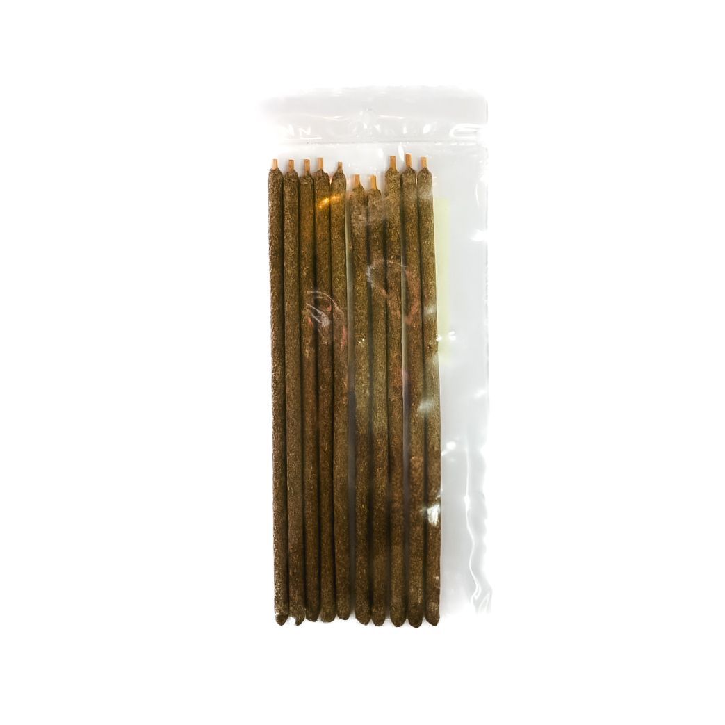 Clear plastic package of brown Palo Santo incense sticks with a bright yellow label.
