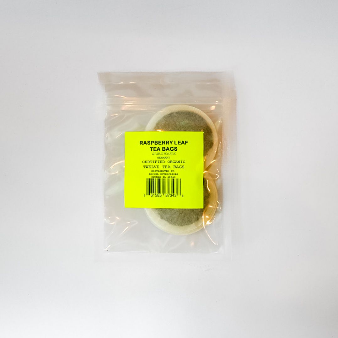 Clear plastic bag holding a neon yellow-labeled item on a white background
