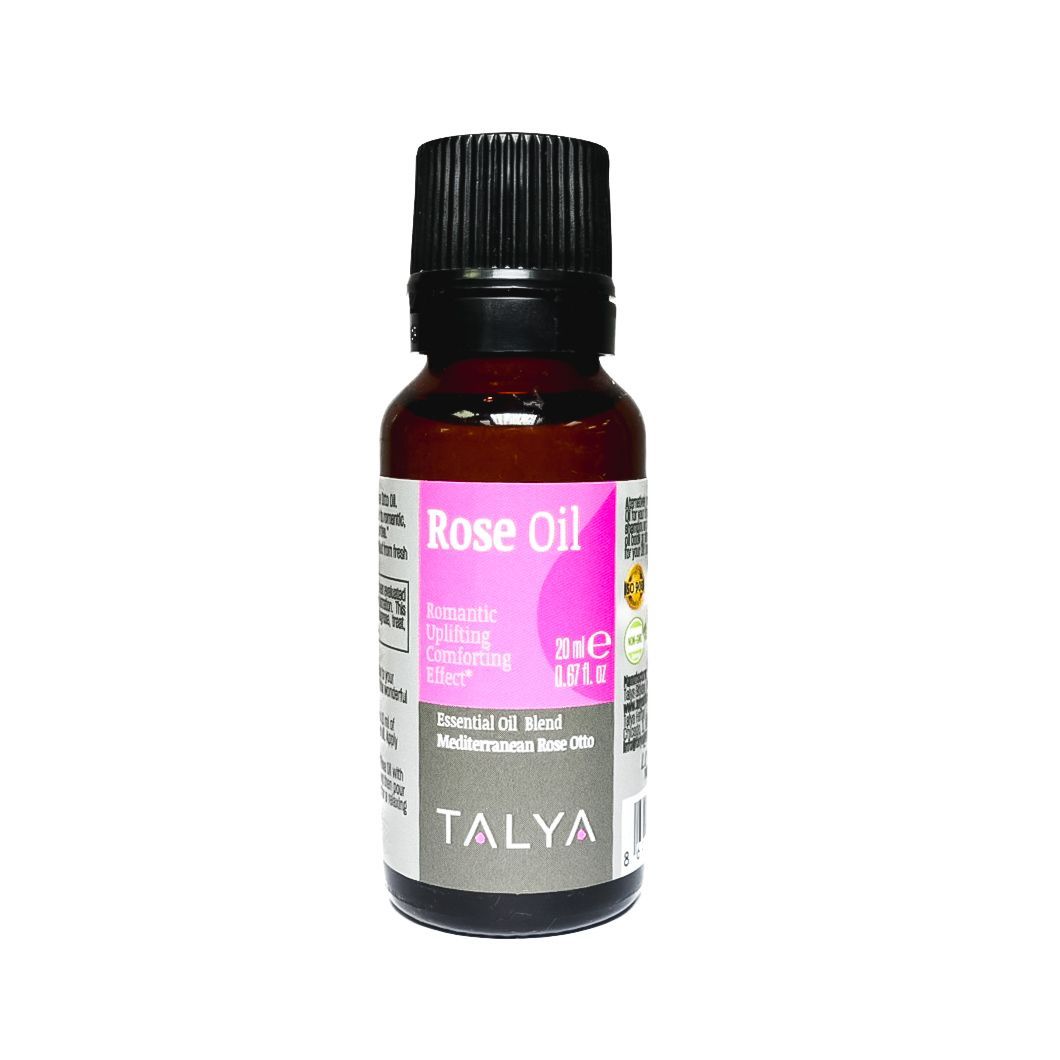Small bottle of Talya rose oil with a black cap and pink label on a white background