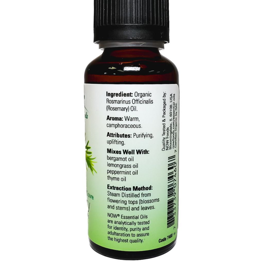 NOW rosemary essential oil bottle with green rosemary sprigs on the label