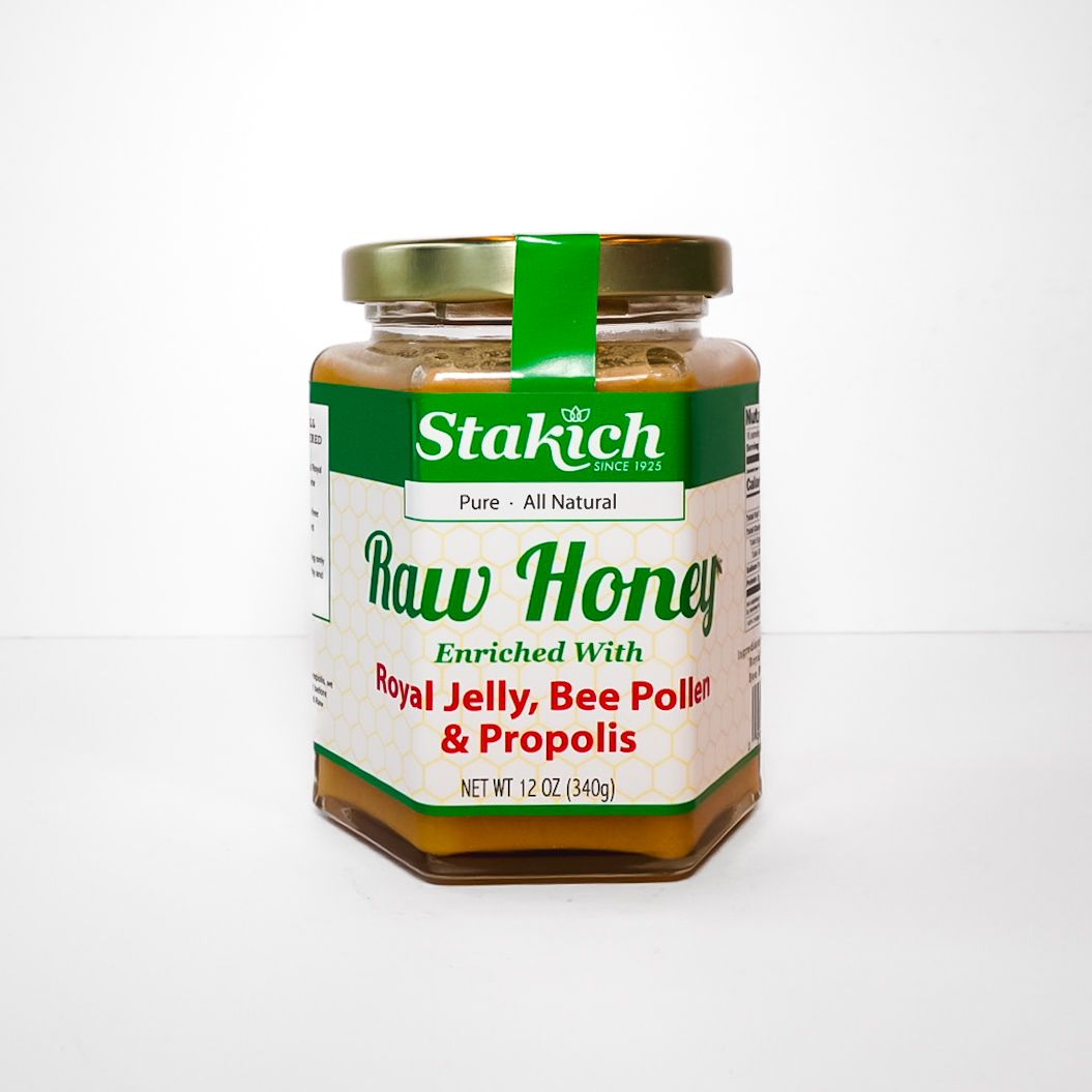 Stakich raw honey jar with green label, royal jelly, bee pollen and propolis