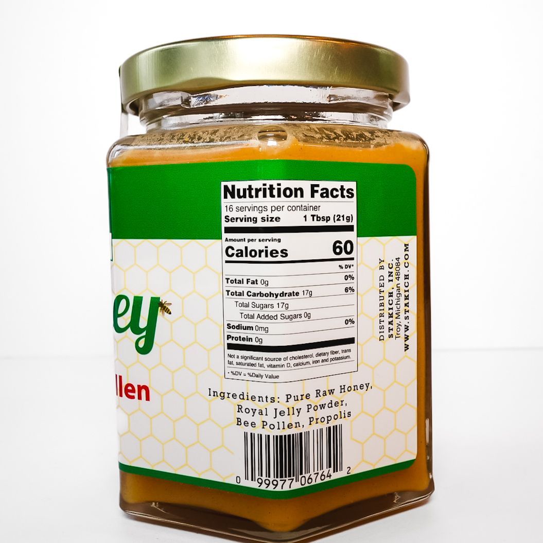 Stakich raw honey jar with green label, royal jelly, bee pollen and propolis