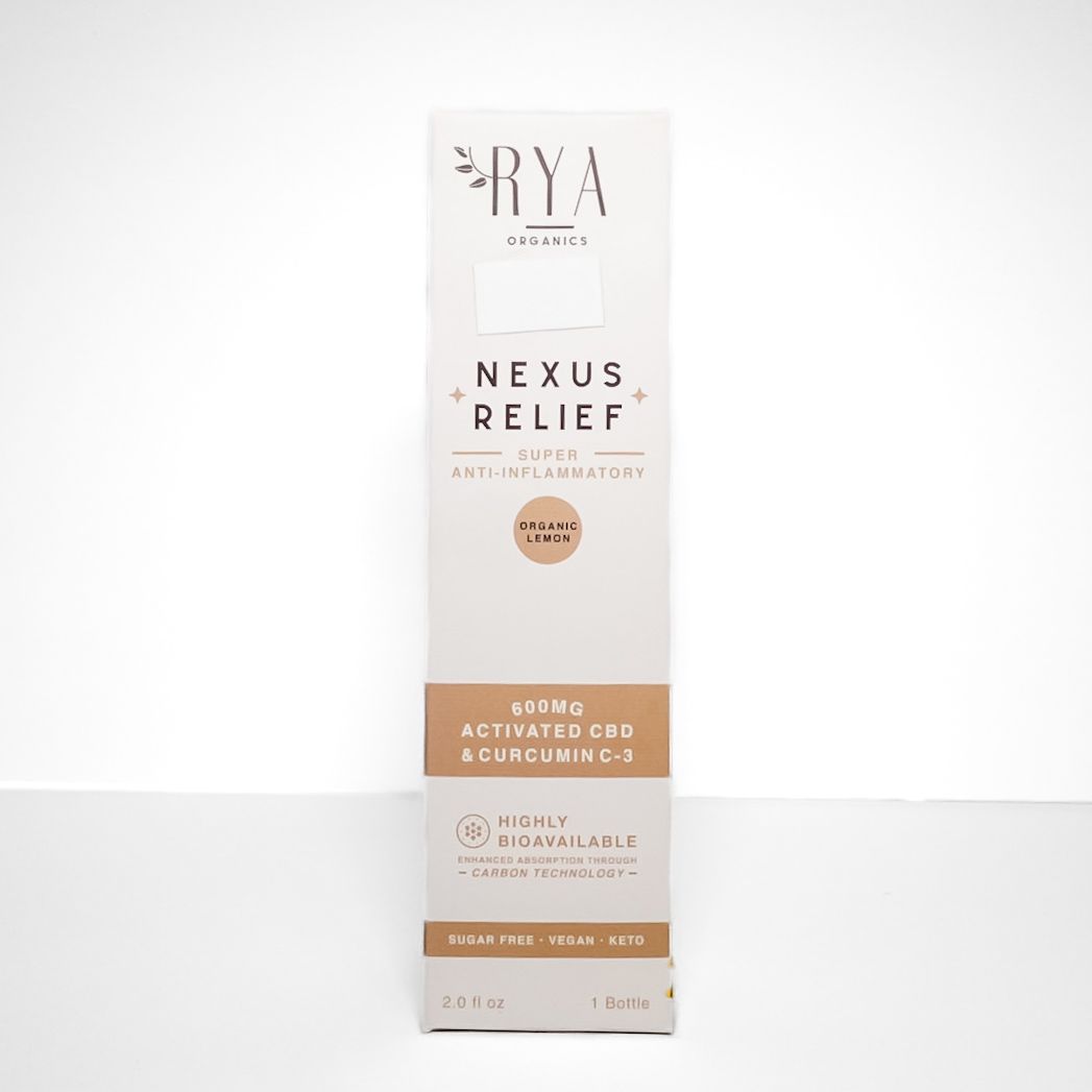 RYA Nexus Relief packaging in white and beige with gold accents on a white background
