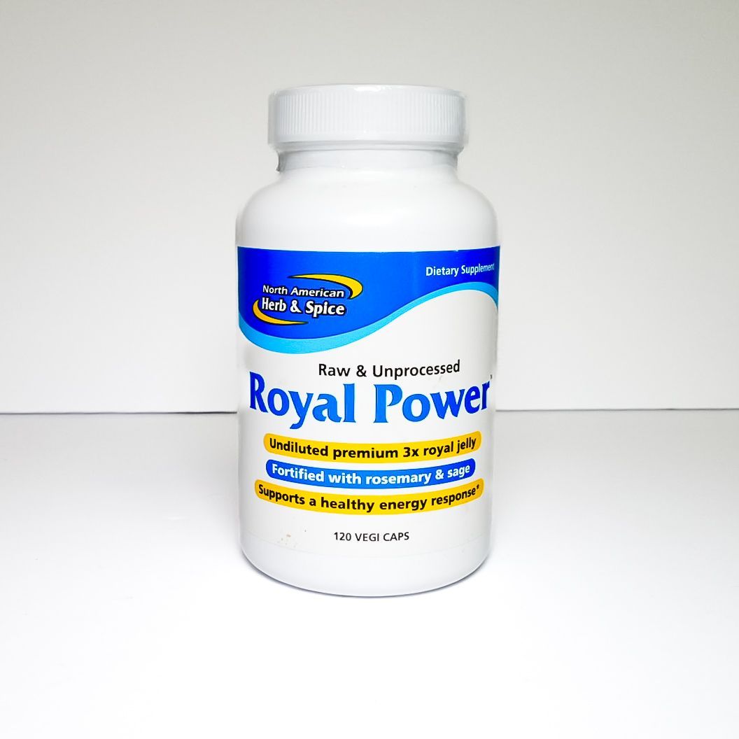 White supplement bottle labeled “Royal Power” with blue and yellow accents on a plain white background