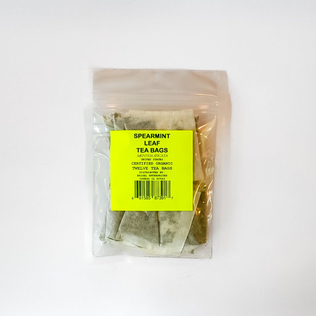 Clear plastic bag of yellow-spearmint leaf tea bags with a bright yellow label
