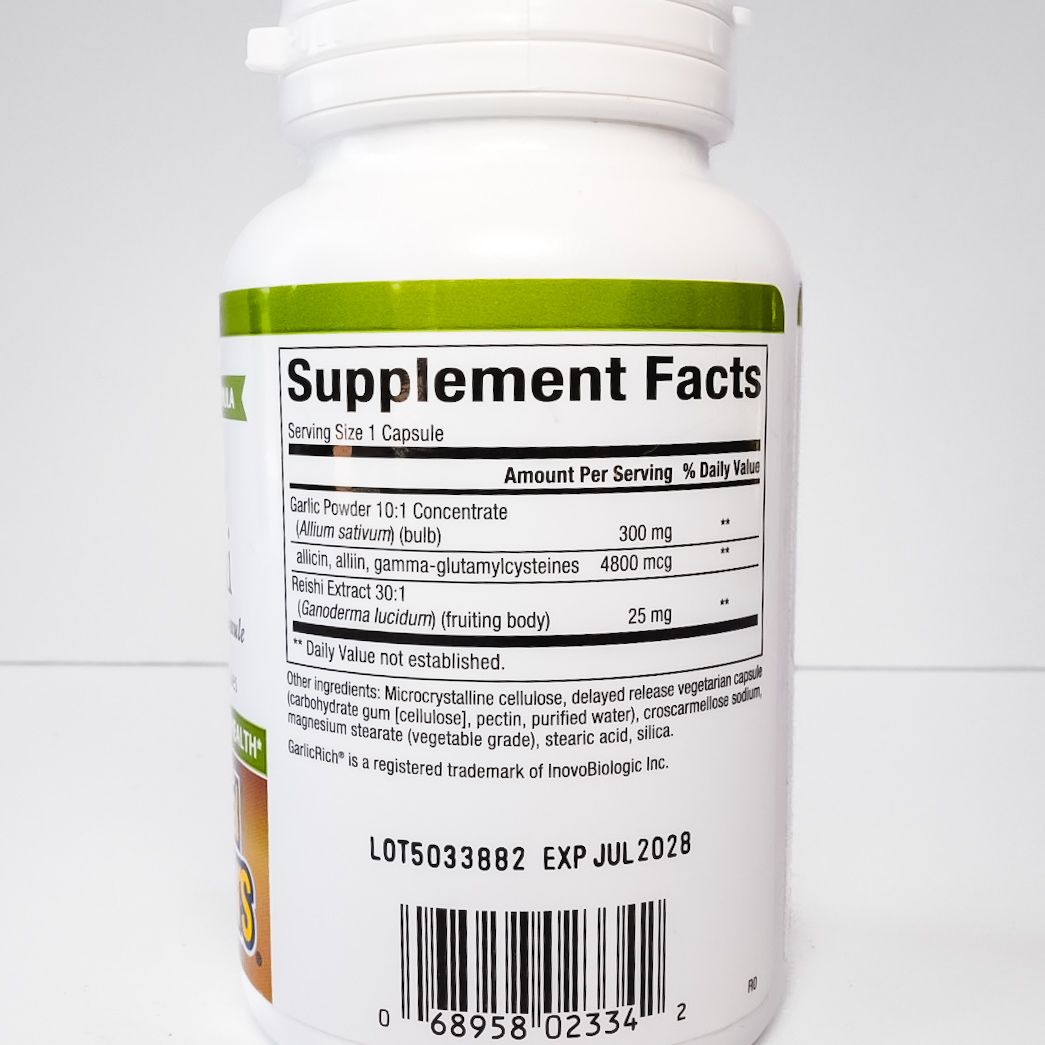 Bottle of Nature’s Factories Super Strength Garlic + Reishi dietary supplement on white background
