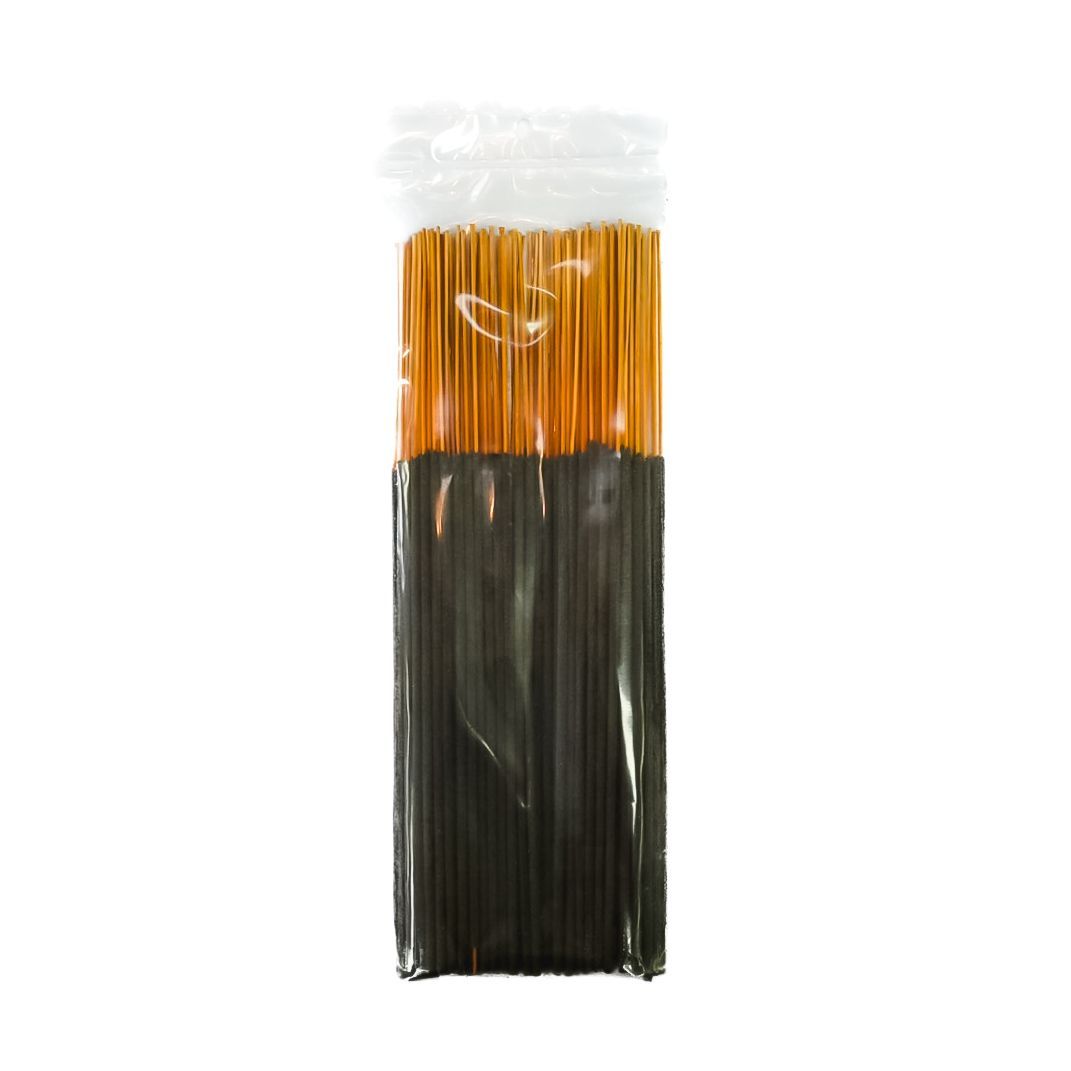 A clear plastic package of black incense sticks with a bright yellow label.