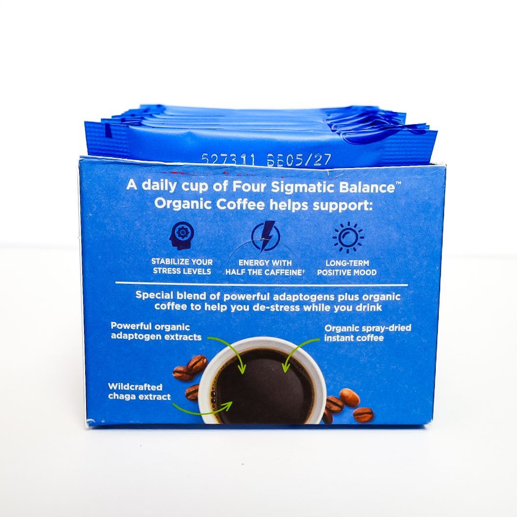 Blue Four Sigmatic Balance organic coffee instant packet with mushrooms on a white background