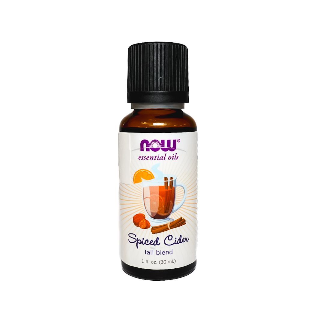 NOW Foods Spearmint essential oil bottle with black cap on white background
