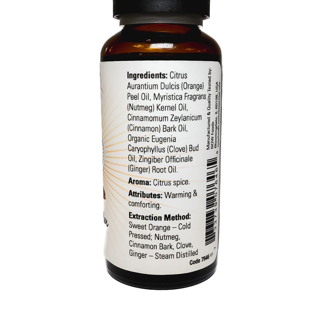 NOW Foods Spearmint essential oil bottle with black cap on white background