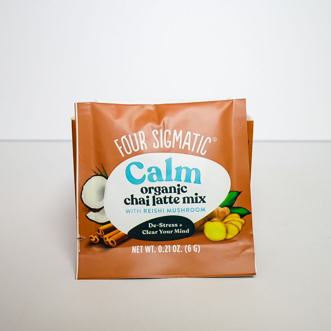 Four Sigmatic Calm organic chai latte mix pouch in orange packaging