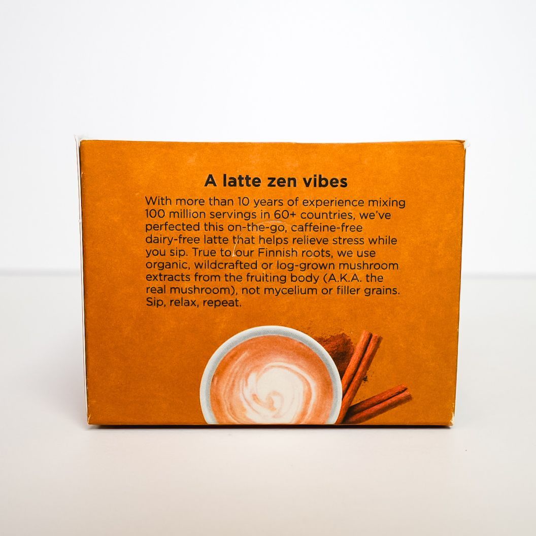 Four Sigmatic Calm organic chai latte mix pouch in orange packaging