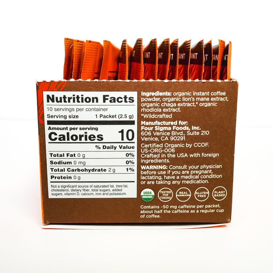 Orange Four Sigmatic Focus organic coffee instant packet on white background