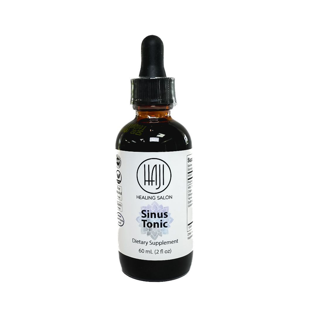 Amber dropper bottle labeled “Sinus Tonic” on a white background