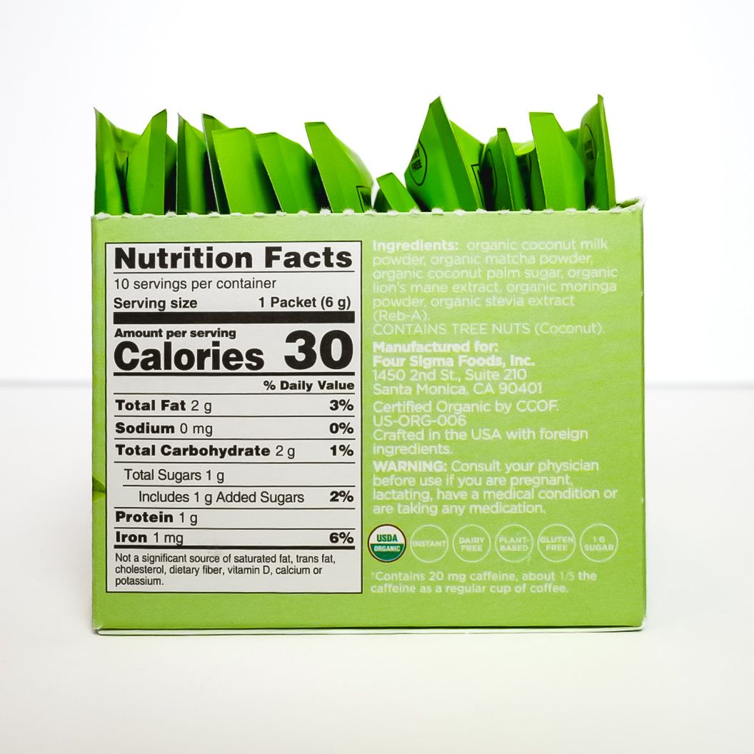 Green Four Sigmatic Think organic matcha latte mix packets with coconut on a white background