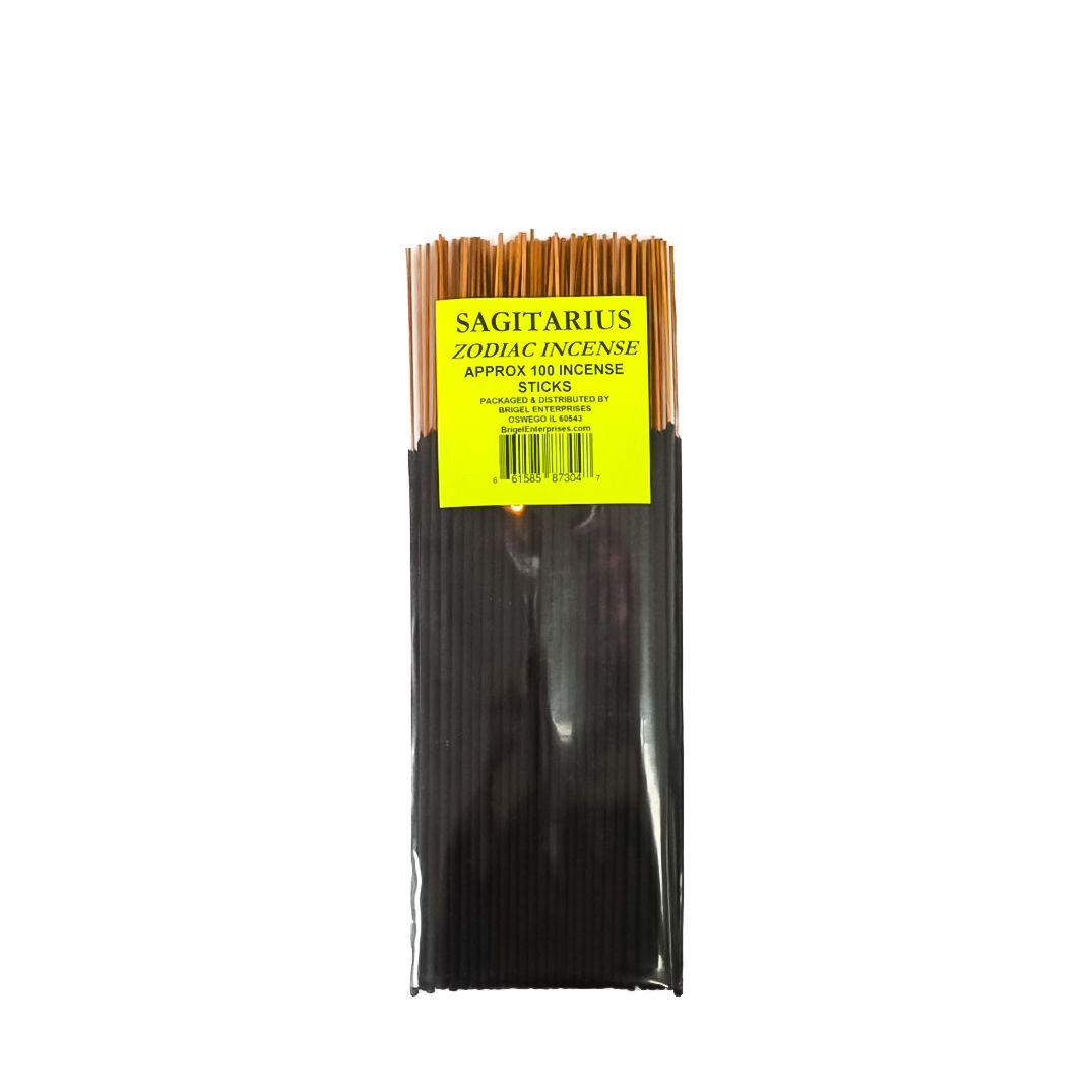 Black spaghetti package with yellow label showing uncooked pasta strands.