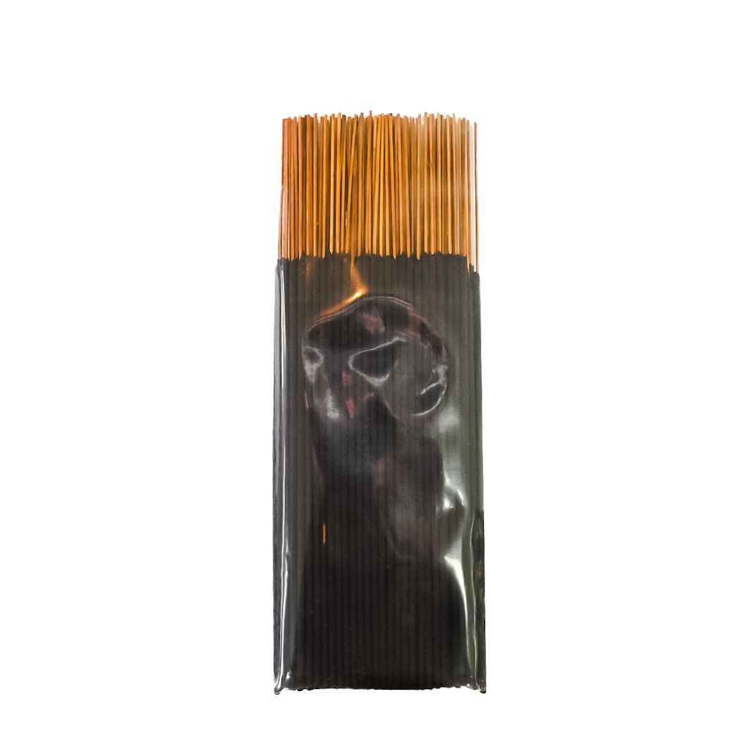Black spaghetti package with yellow label showing uncooked pasta strands.