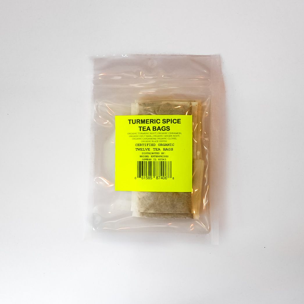 Plastic bag of Turmeric Spice Tea Bags with bright yellow label on a white background