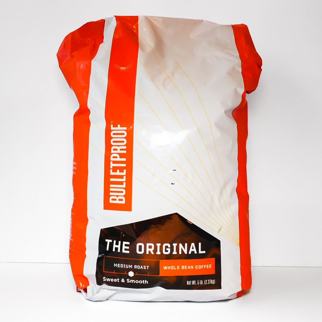White and red Bulletproof coffee bag with “The Original” label on a plain background