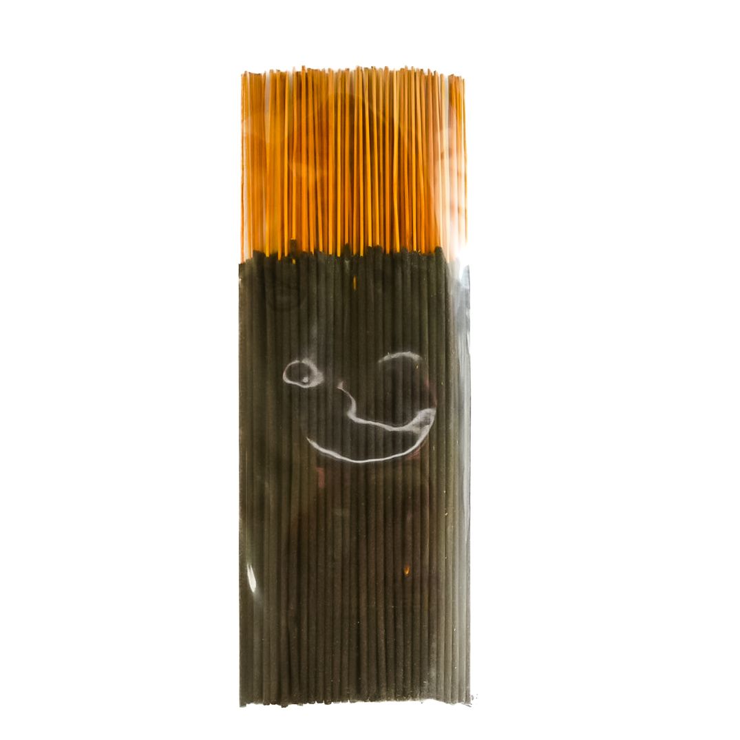 Yellow-capped packaged item with a dark brown transparent wrapper and a bright label.