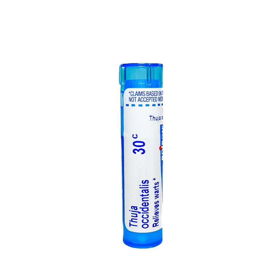 Small blue-and-white medicine vial labeled “30°C” on a white background