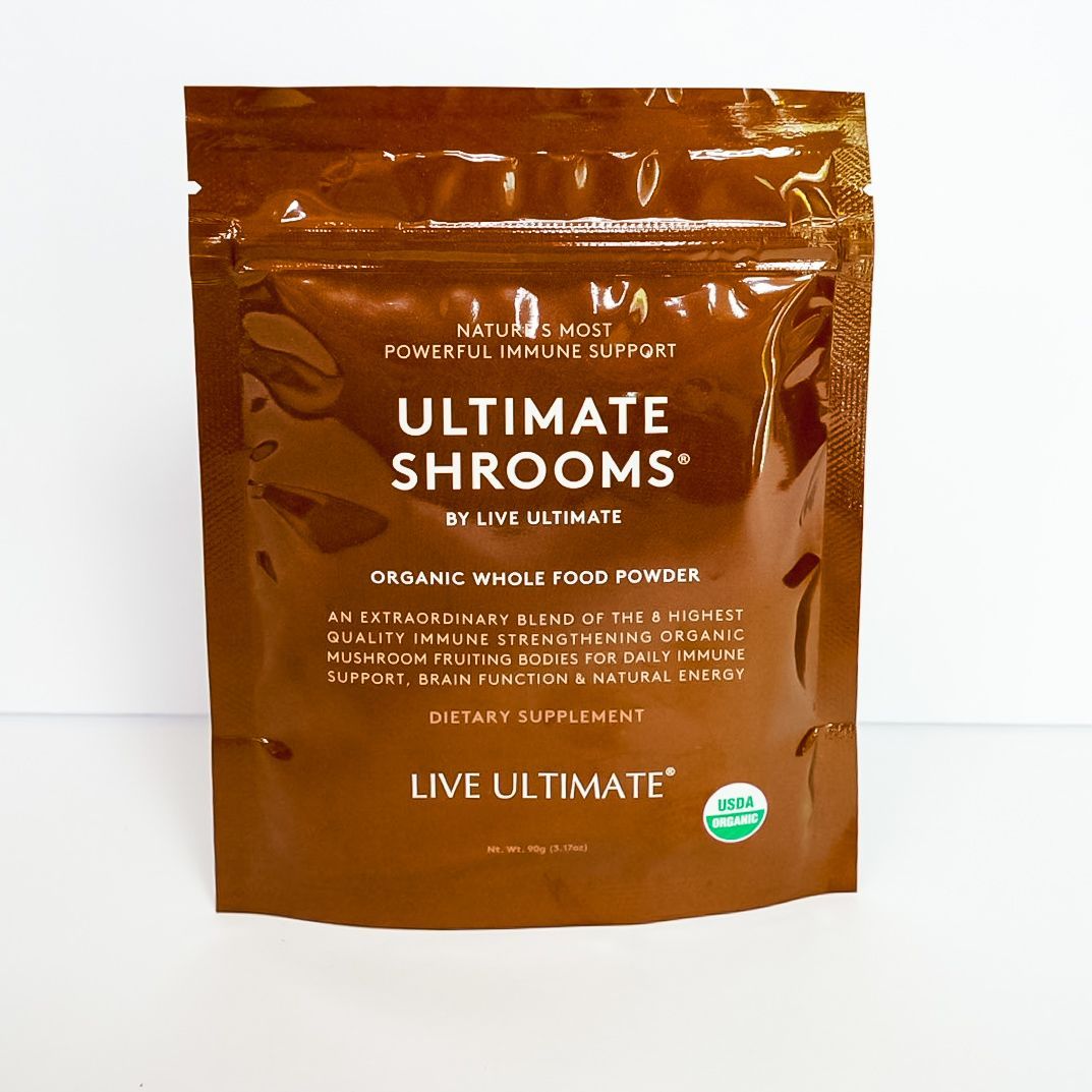 Brown pouch of Ultimate Shrooms organic whole-food powder standing against a white background