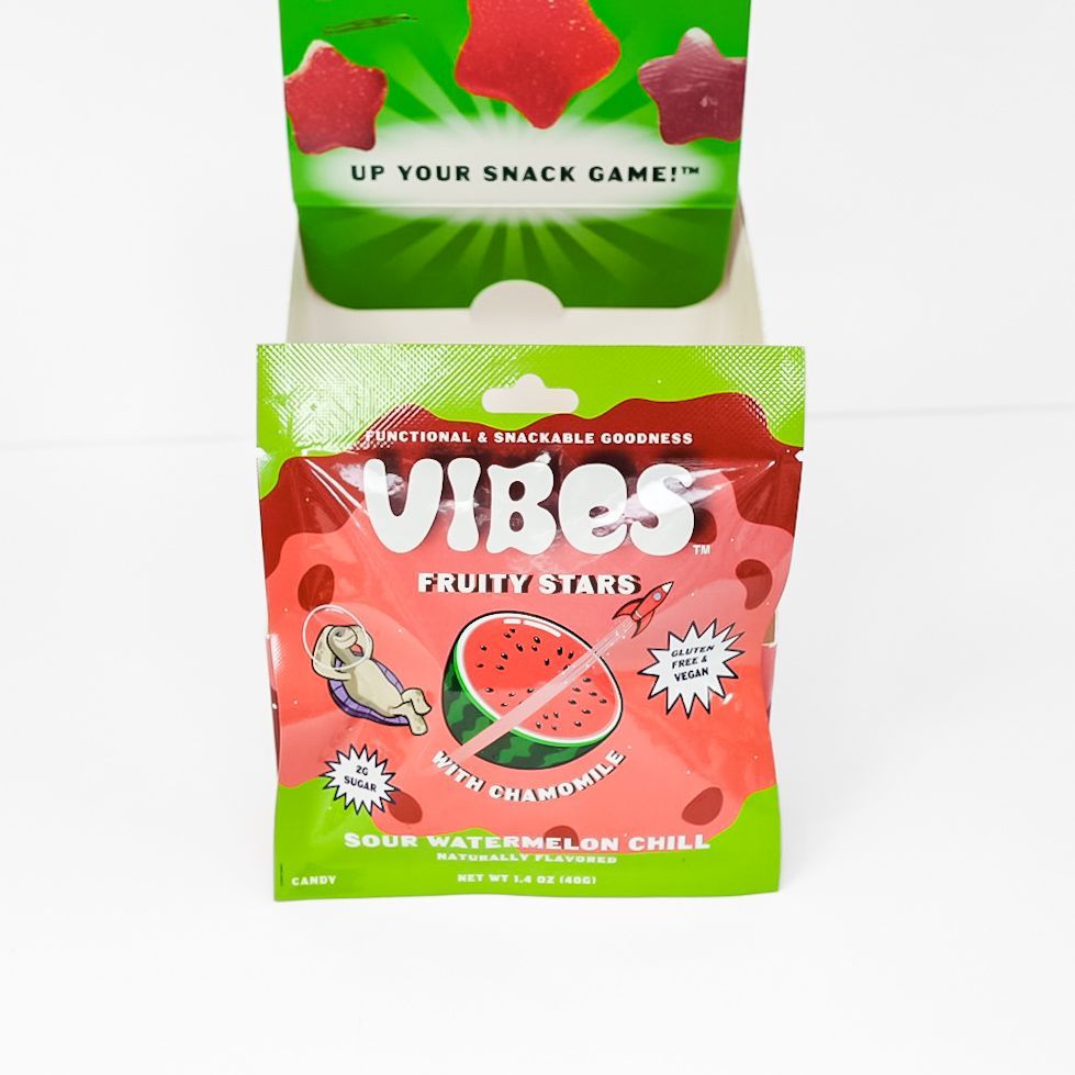 Two Vibez fruity stars snack bags, red and green, on a white background