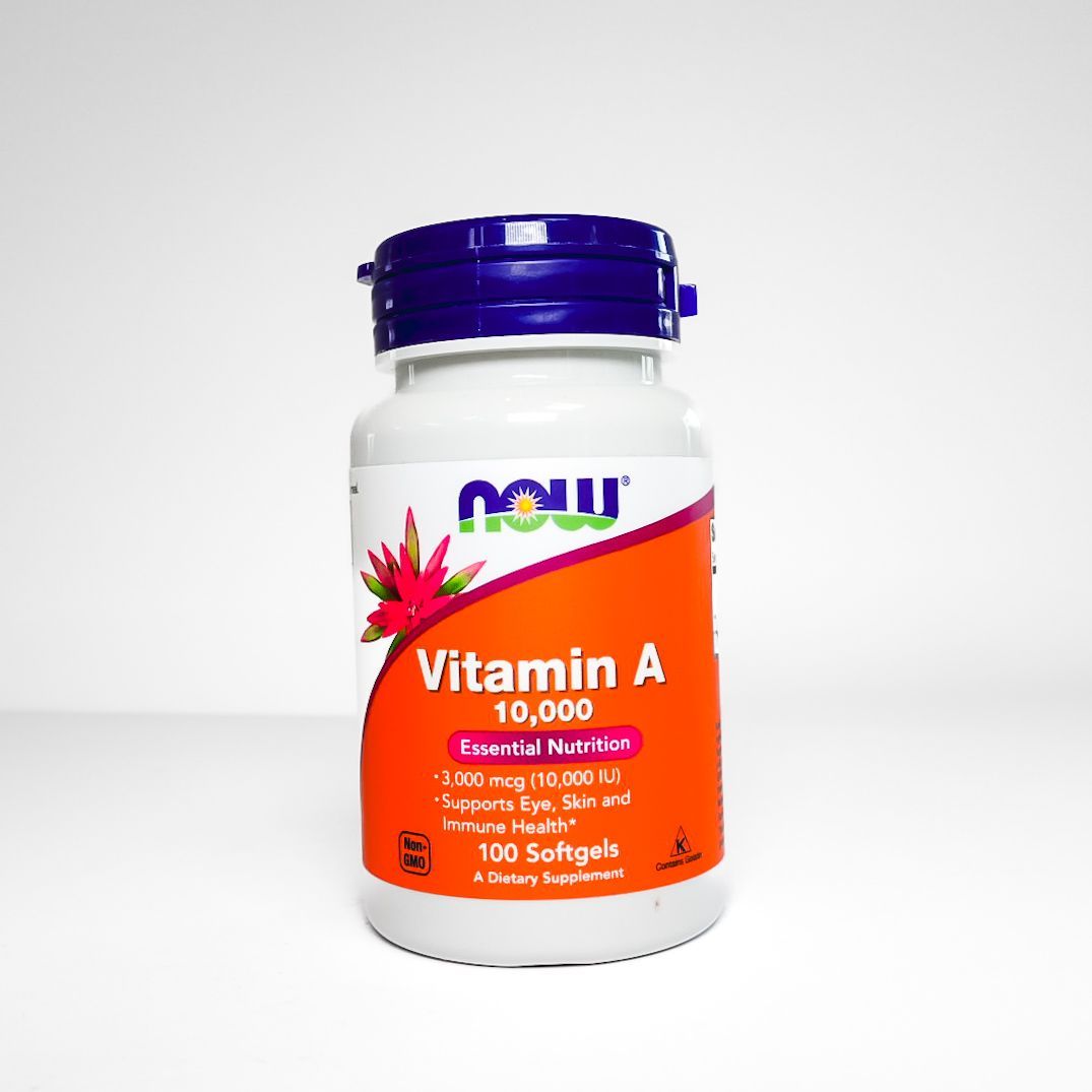 Now Vitamin A 10,000 softgels bottle with blue cap and orange label on white background