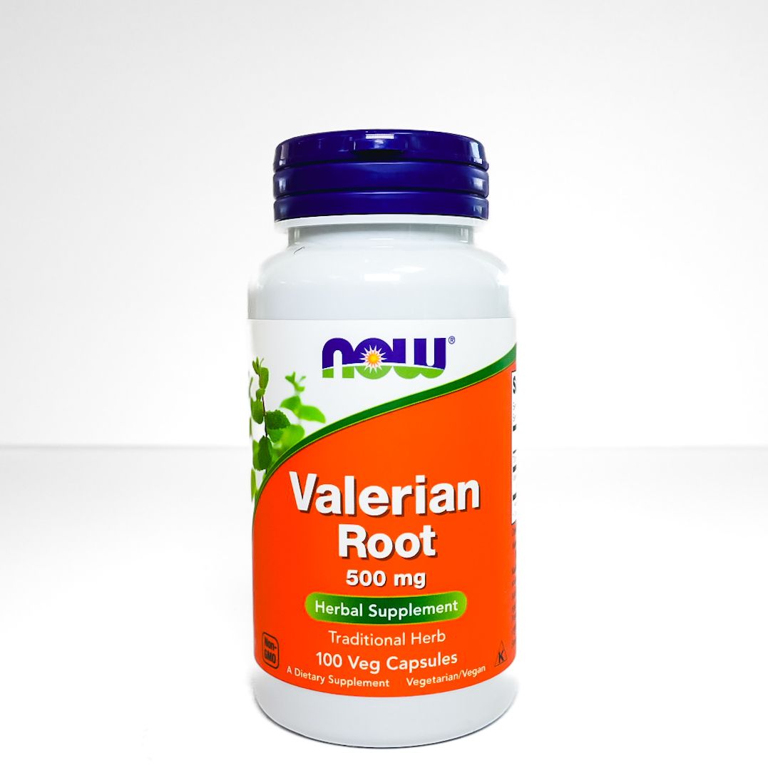 NOW Valerian Root 500 mg supplement bottle with orange label and purple cap