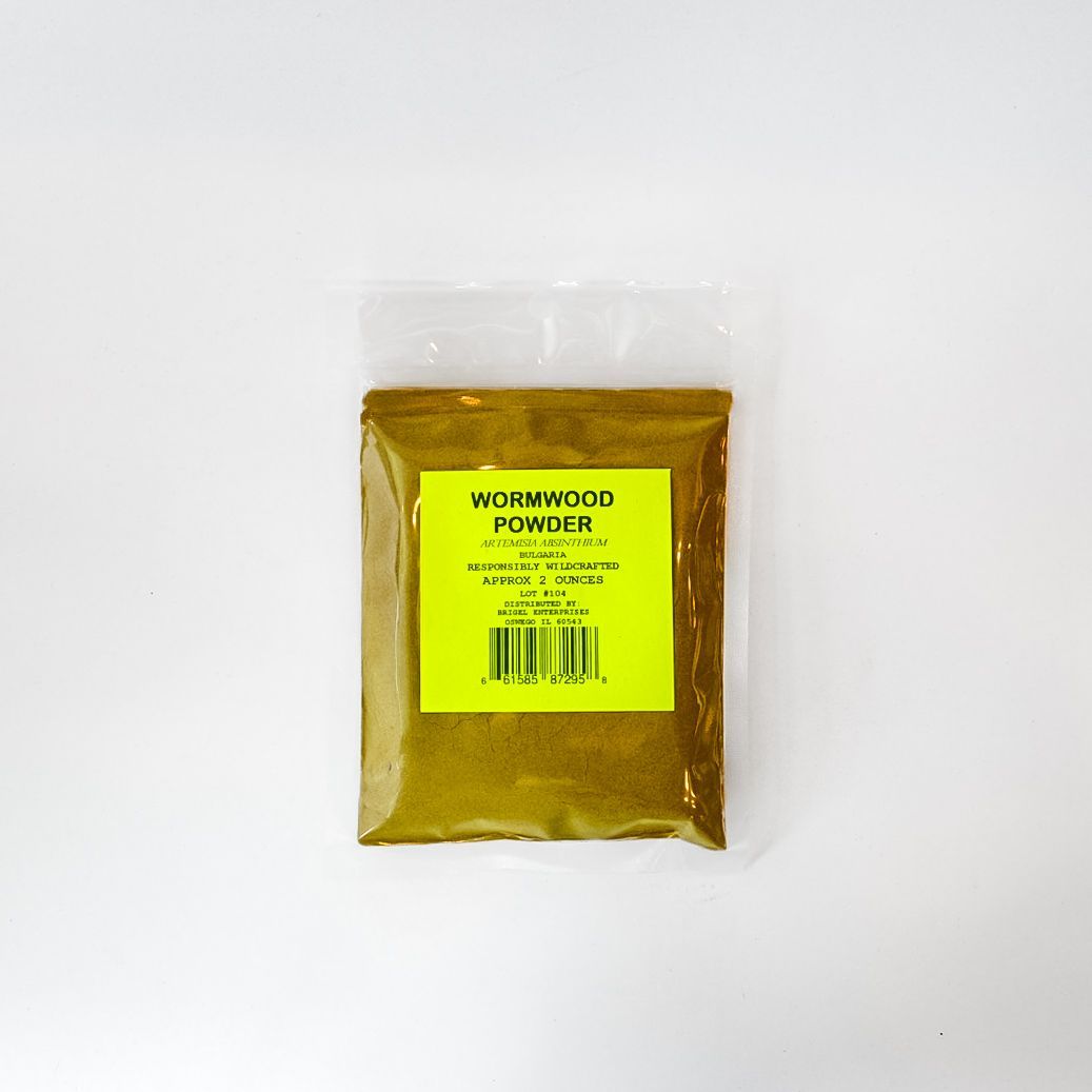 Clear plastic bag of yellow wormwood powder with a bright green label on a white background