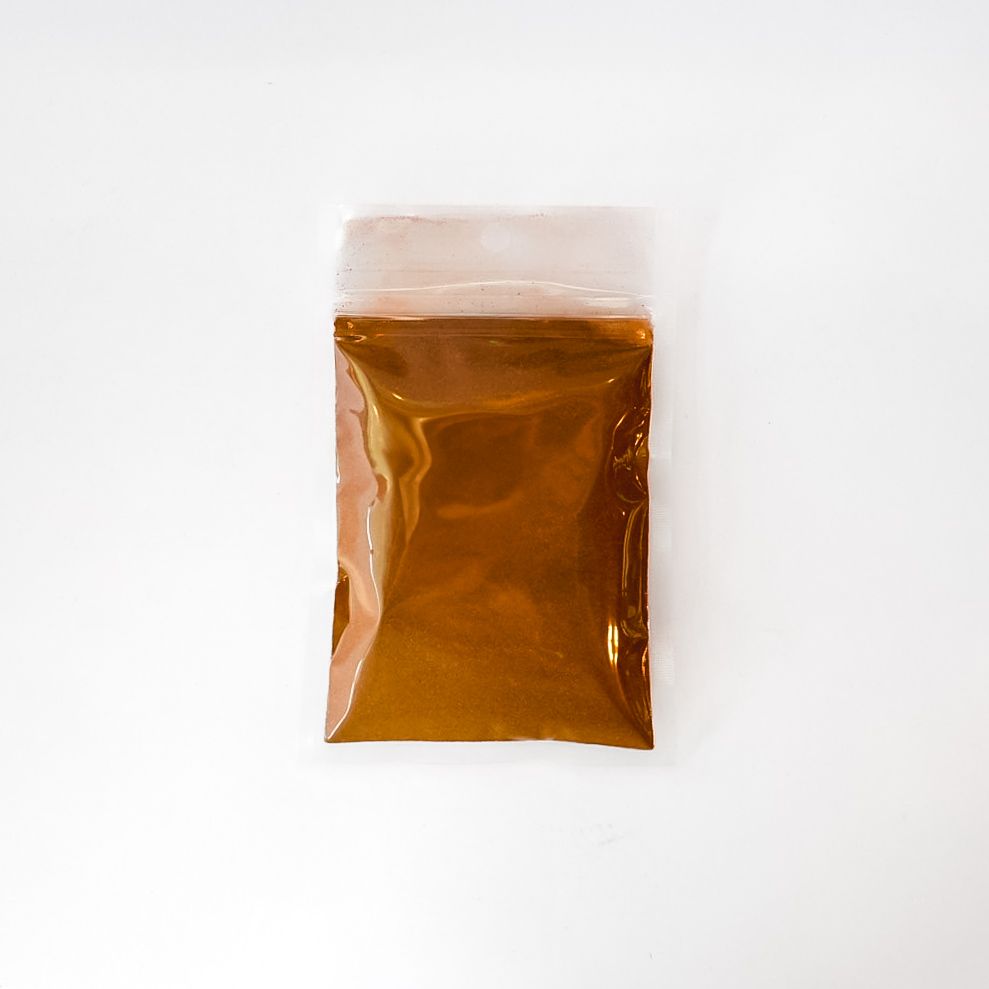 Clear plastic bag of white oak tan powder with yellow label on a white background