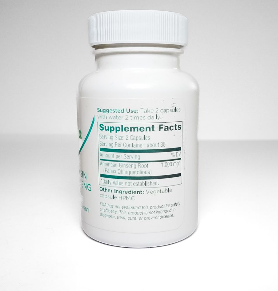 White supplement bottle labeled “Organic Rootz” and “100% Wisconsin American Ginseng” on a white background