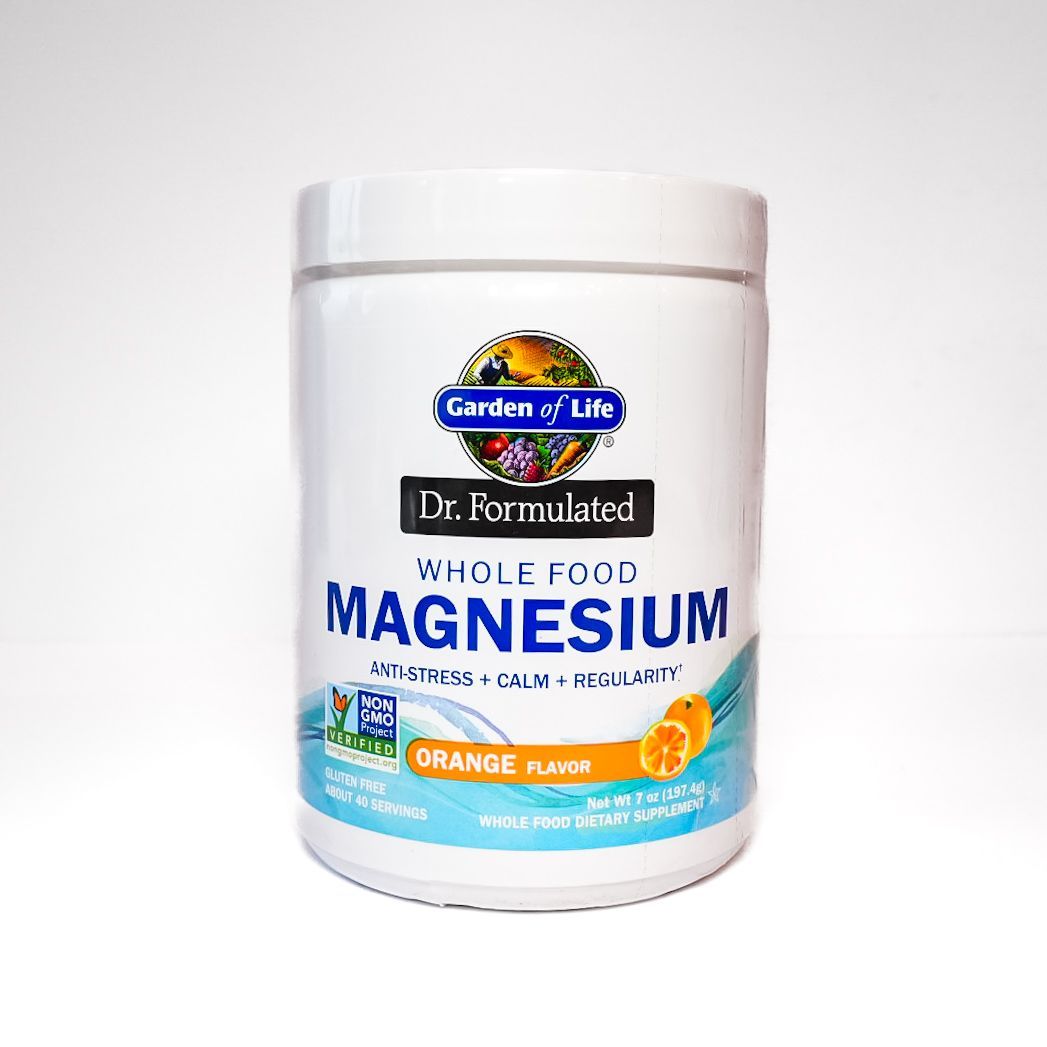 Dr. Formulated magnesium supplement container with orange flavor label on a white background